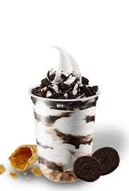 Mixue Malaysia 9 soft serve vanilla with drizzling chocolate sauce and crushed chocolate cookies
